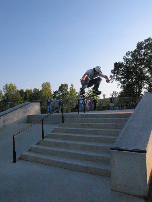Bryan Park catches a kickflip down the 8
